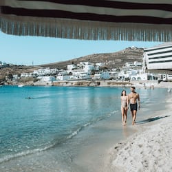 On the beach, sun-loungers, beach umbrellas, beach towels