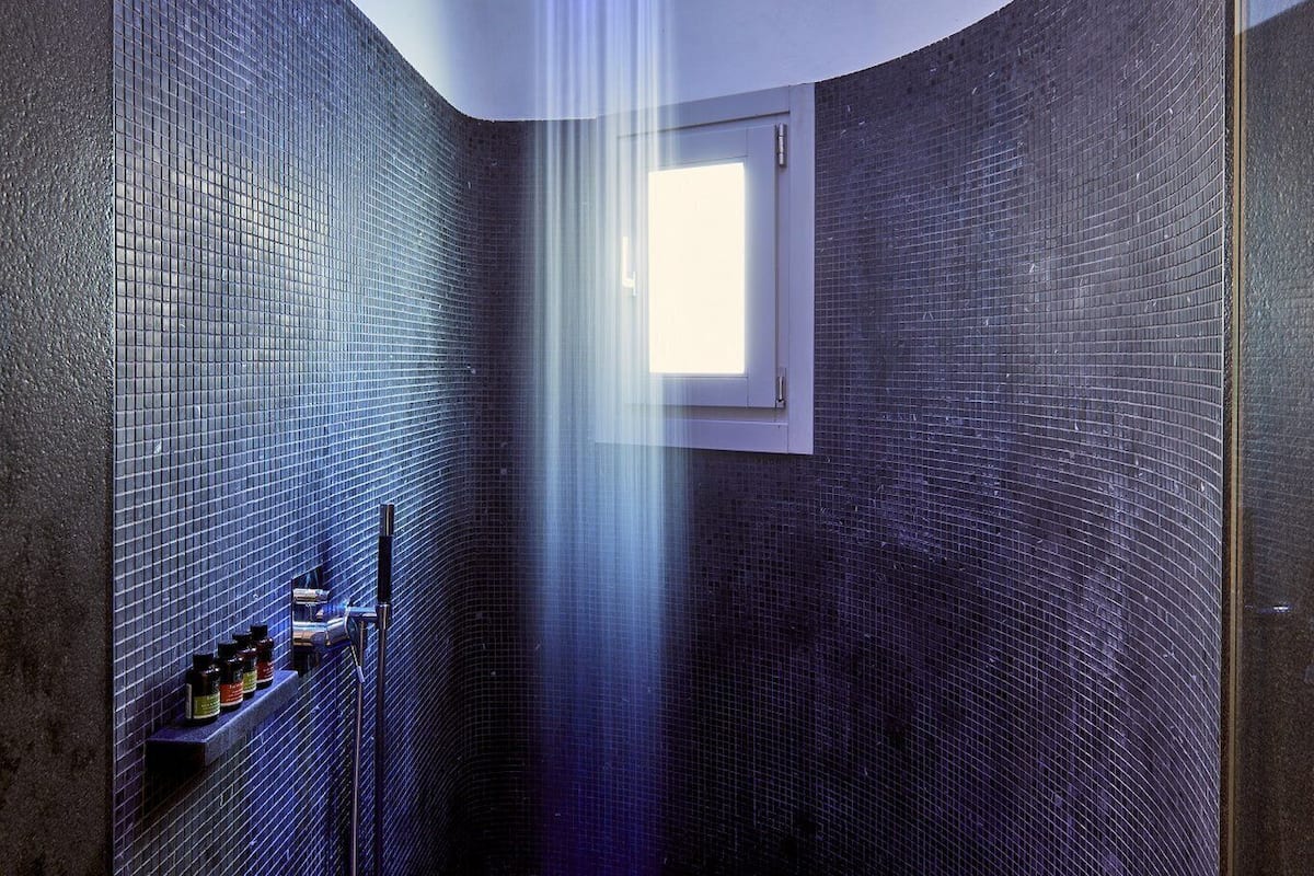 shower, rainfall showerhead, designer toiletries, hair dryer