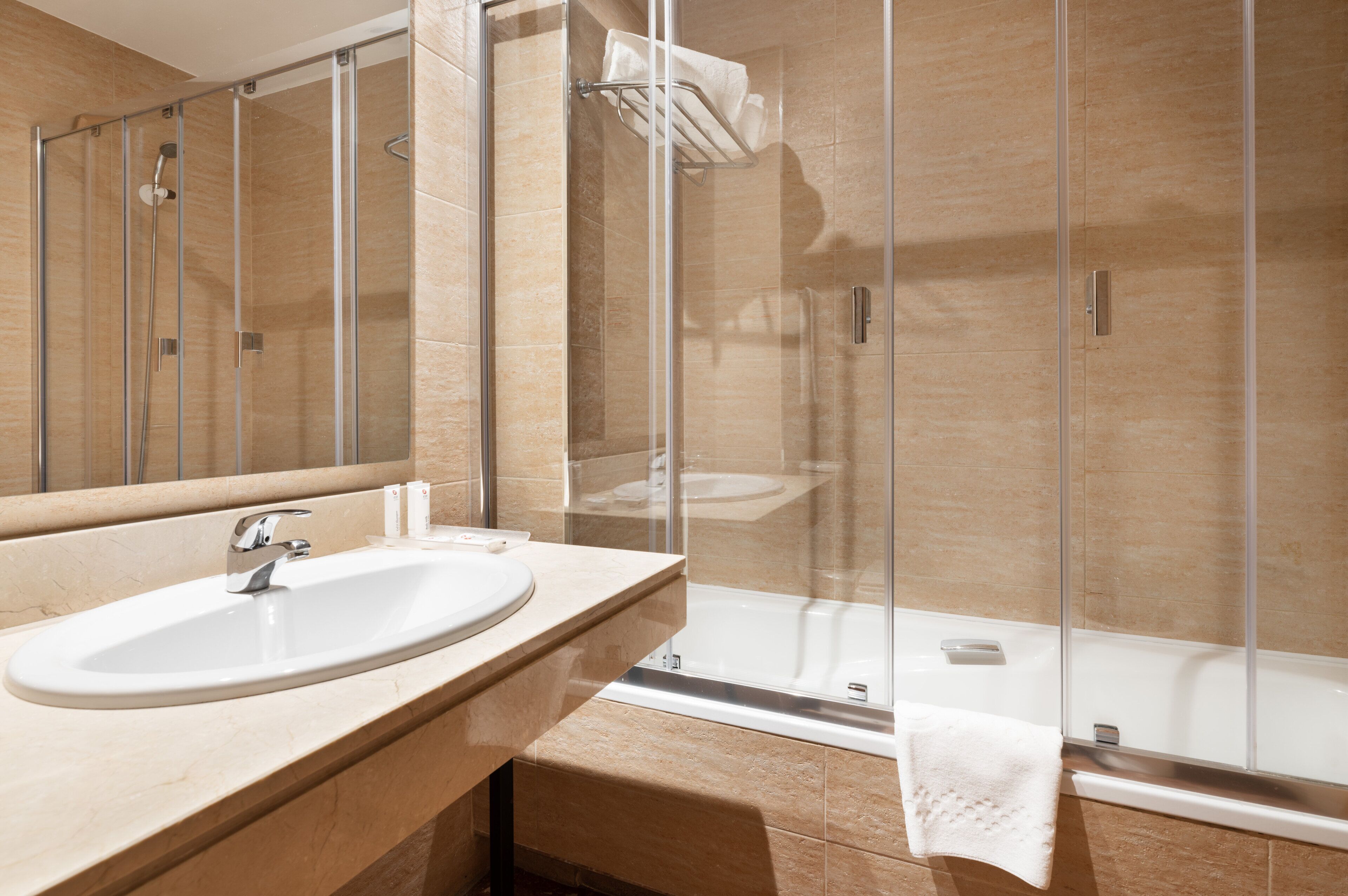Bathtub, eco-friendly toiletries, hair dryer, bidet