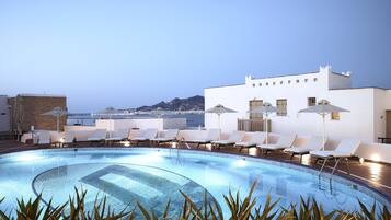Outdoor pool, pool umbrellas, pool loungers