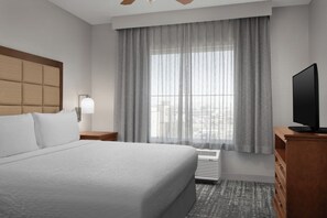 Desk, laptop workspace, blackout drapes, iron/ironing board