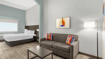 Suite, 1 King Bed, Non Smoking | Pillowtop beds, in-room safe, individually decorated, desk