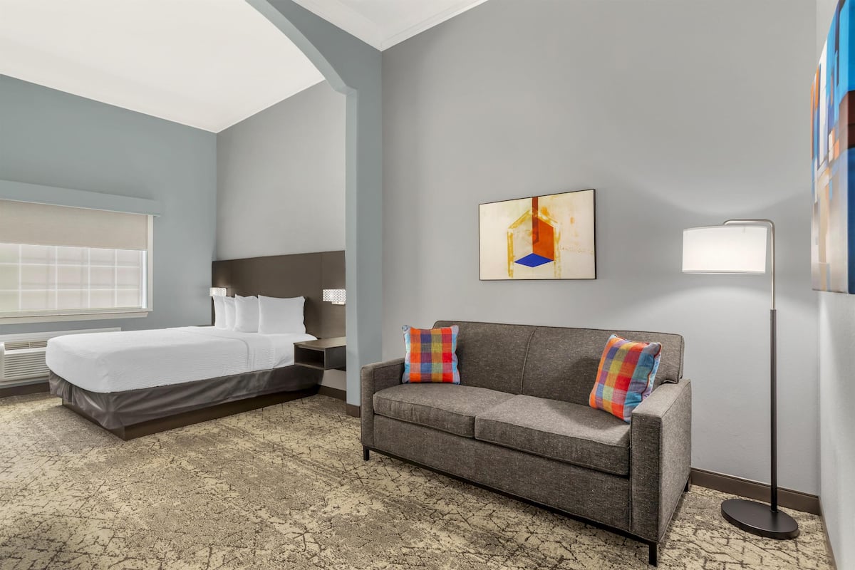Suite, 1 King Bed, Accessible | Pillow-top beds, in-room safe, individually decorated, desk