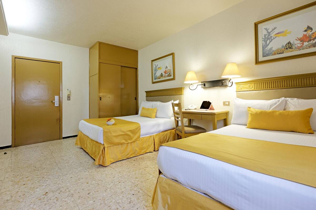 In-room safe, desk, blackout curtains, iron/ironing board (on request)
