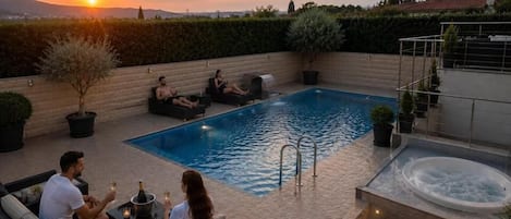 Indoor pool, seasonal outdoor pool, pool umbrellas