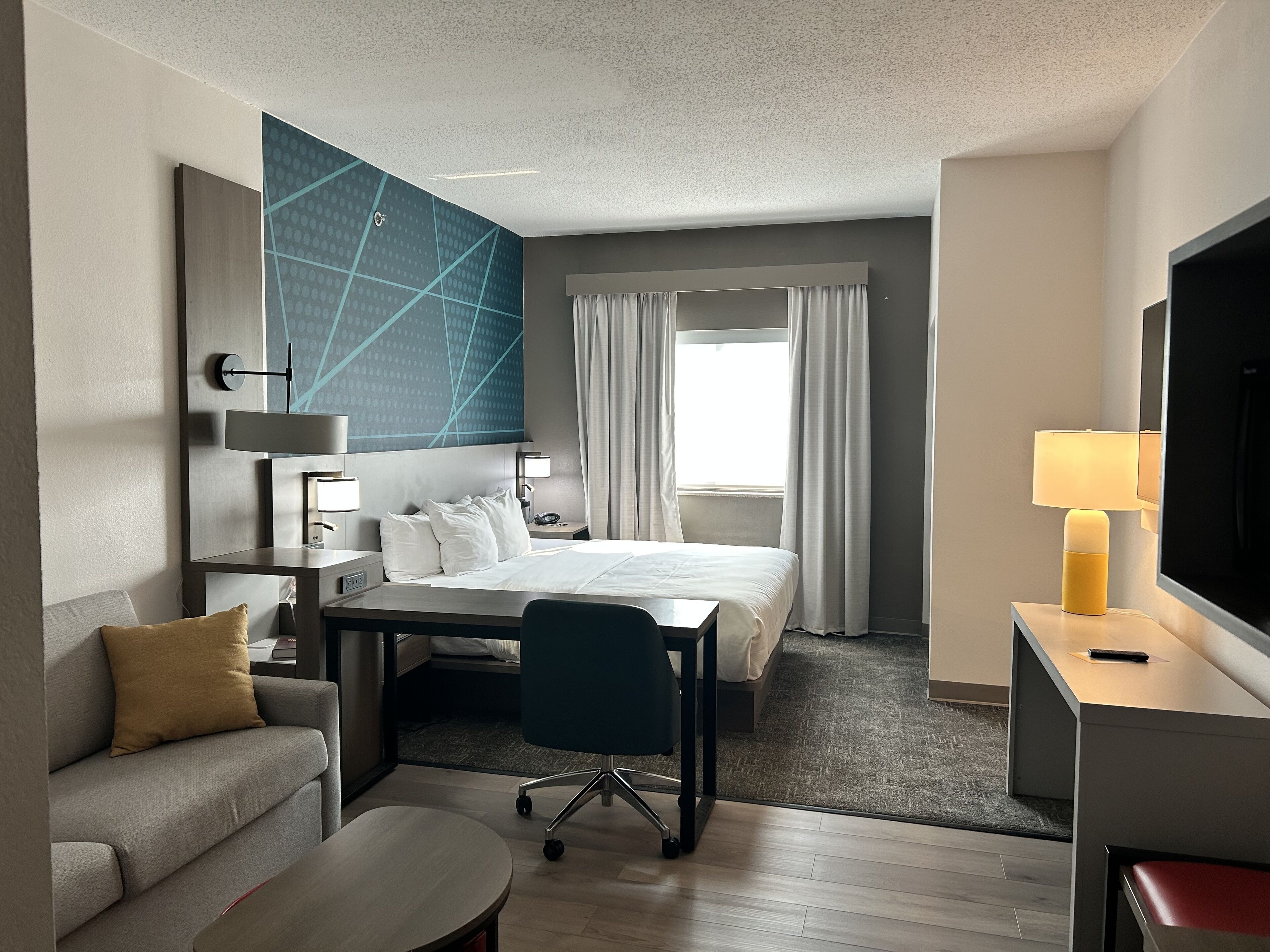 desk, blackout curtains, iron/ironing board, free cots/infant beds