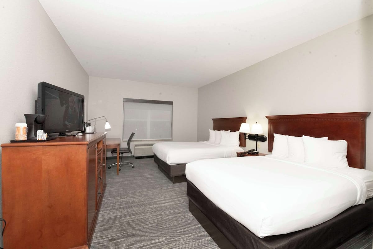 Room, 2 Queen Beds, Non Smoking | In-room safe, desk, blackout drapes, iron/ironing board