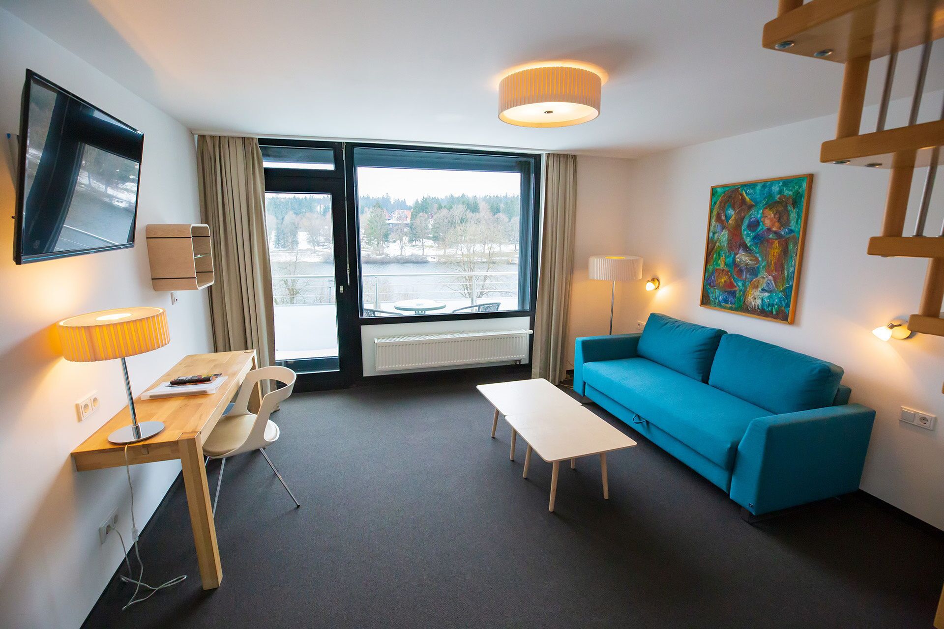 junior suite | living area | flat-screen tv