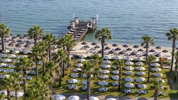 Privat strand, gratis strandcabanor, solstolar och parasoller