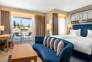 Junior Suite, Balcony, Pool View | 1 bedroom, premium bedding, minibar, desk