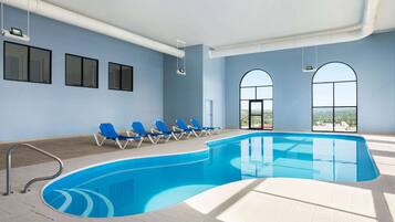 Indoor pool, open 10:00 AM to 10:00 PM, sun loungers