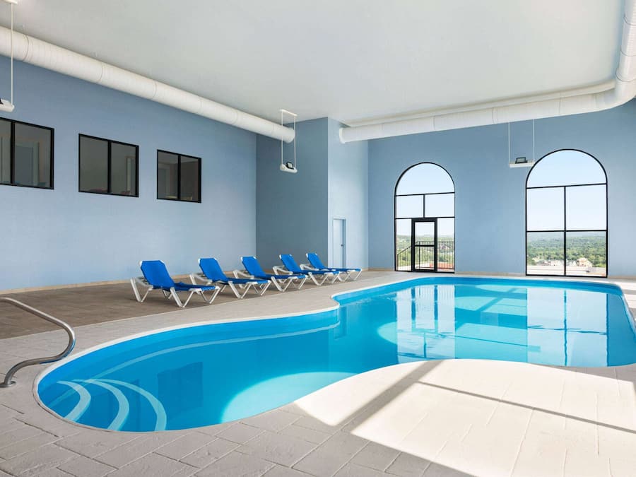 Indoor pool, open 10:00 AM to 10:00 PM, sun loungers