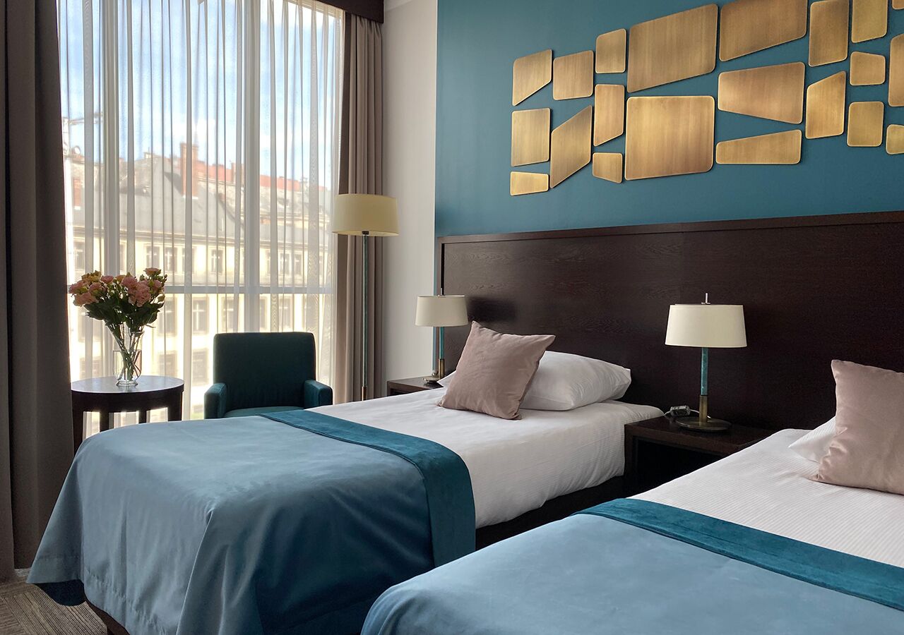 classic twin room, 2 single beds | in-room safe, desk, soundproofing, iron/ironing board