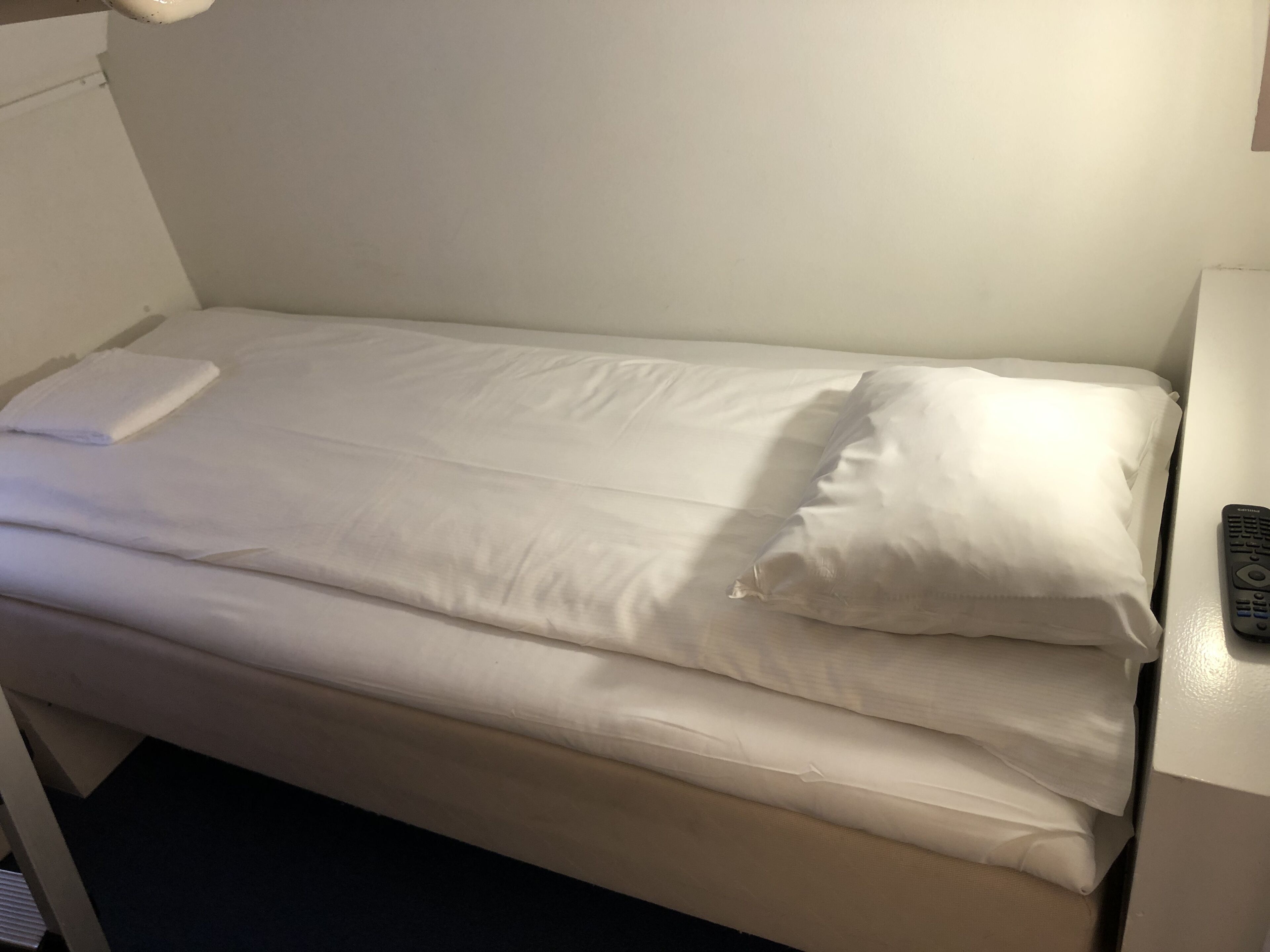 premium bedding, pillow-top beds, blackout curtains, soundproofing