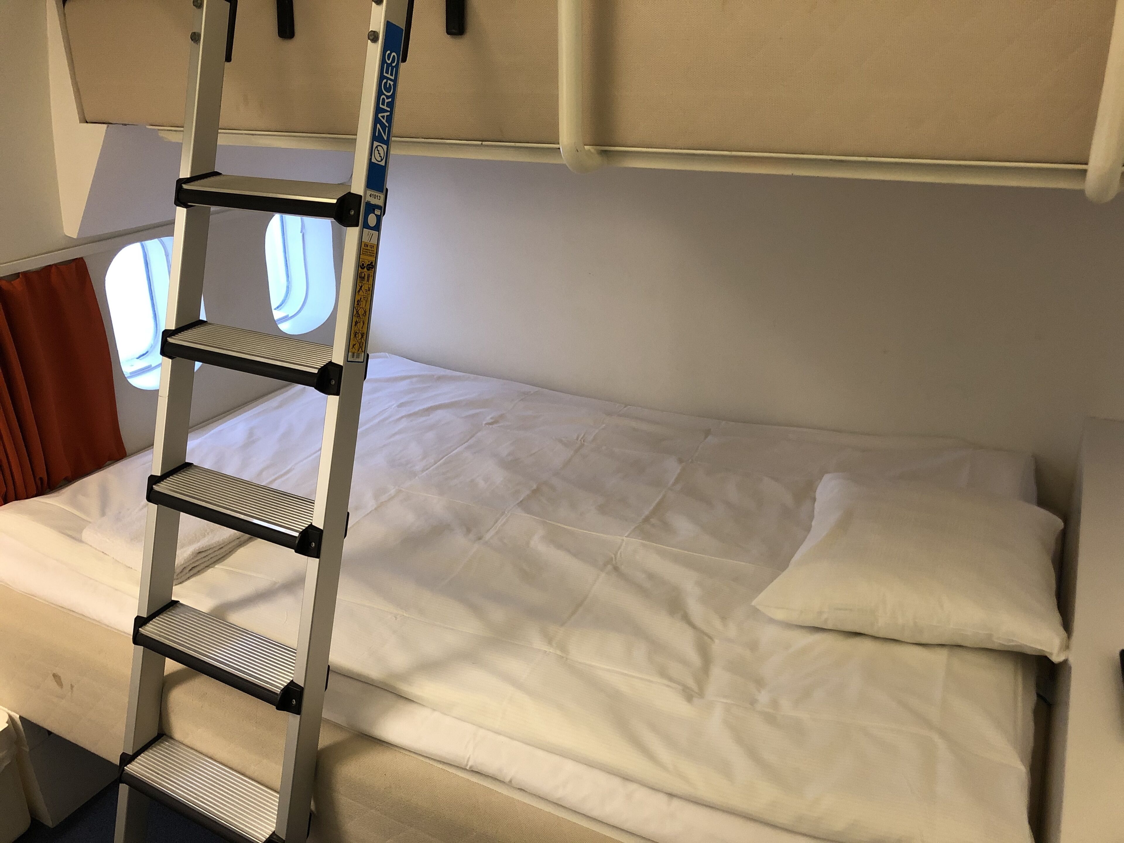 premium bedding, pillow-top beds, blackout curtains, soundproofing