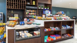 A grocery store with a variety of products on shelves and in bins, including snacks, beverages, and packaged goods. - Hilton Garden Inn Hanover Arundel Mills,  MD (Hanover)