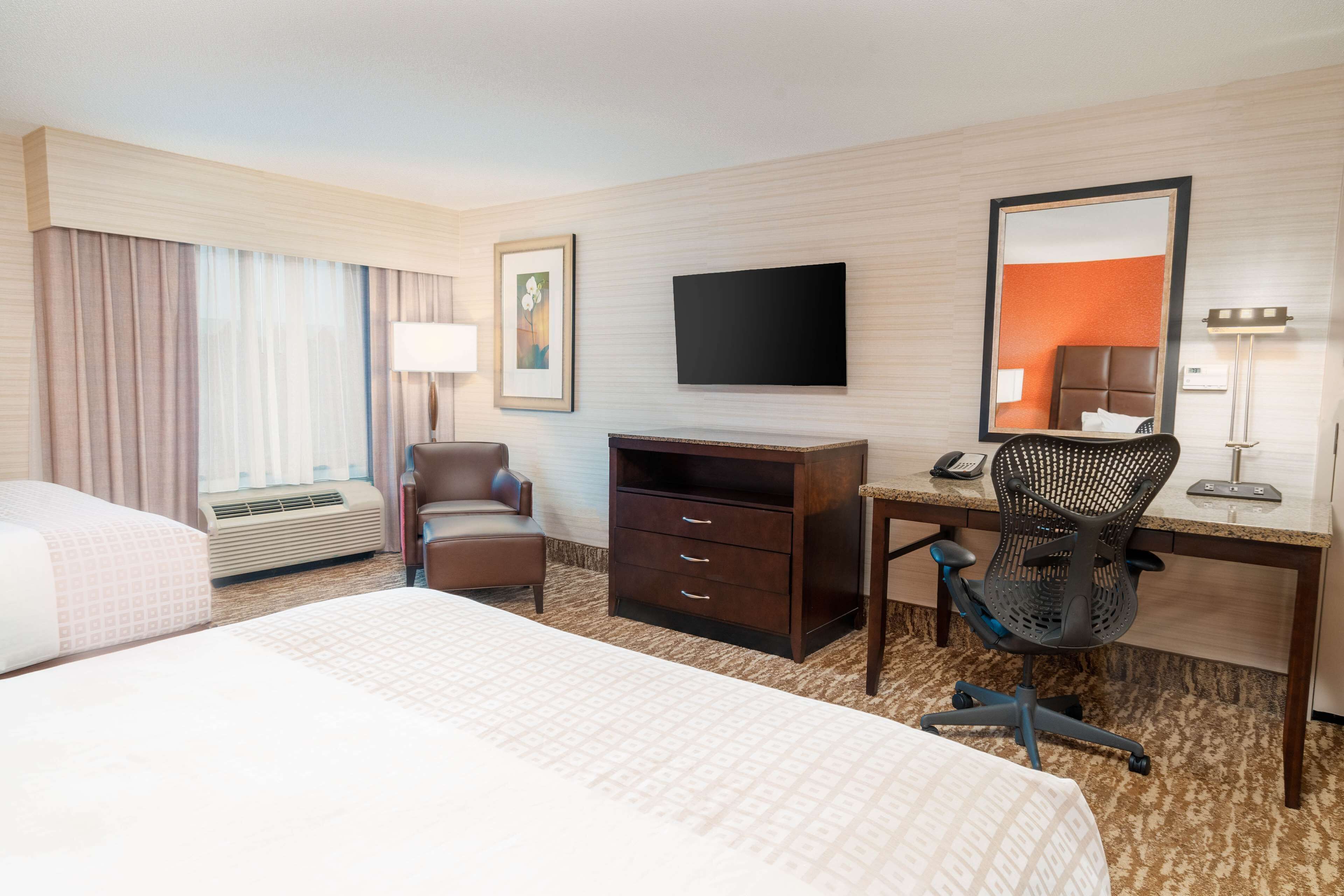Premium bedding, pillow-top beds, in-room safe, desk