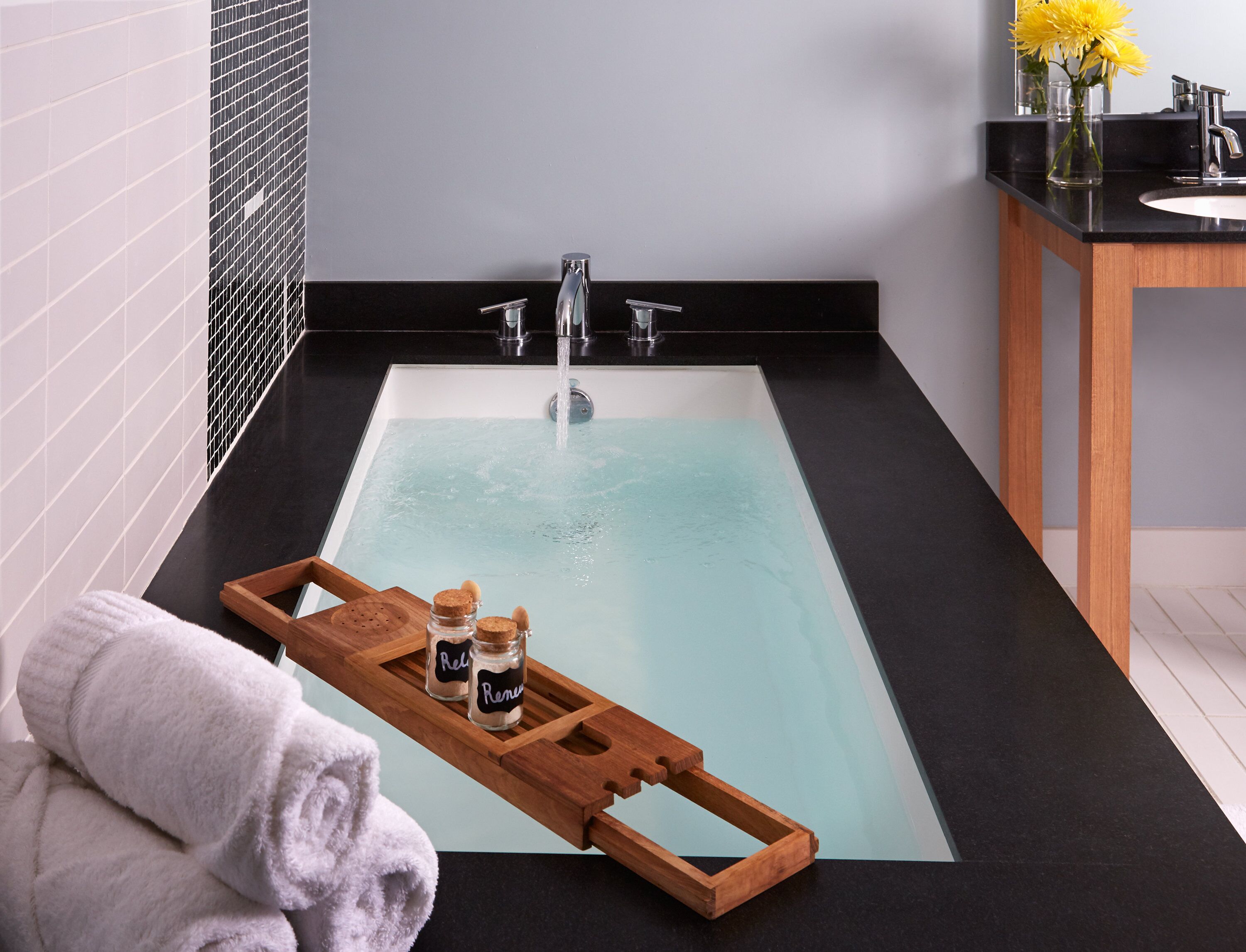 designer toiletries, hair dryer, bathrobes, towels