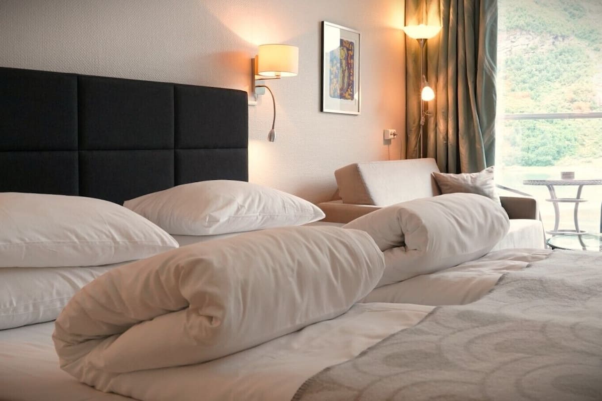 superior double or twin room (fjord view) | pillow-top beds, desk, wifi, bed sheets