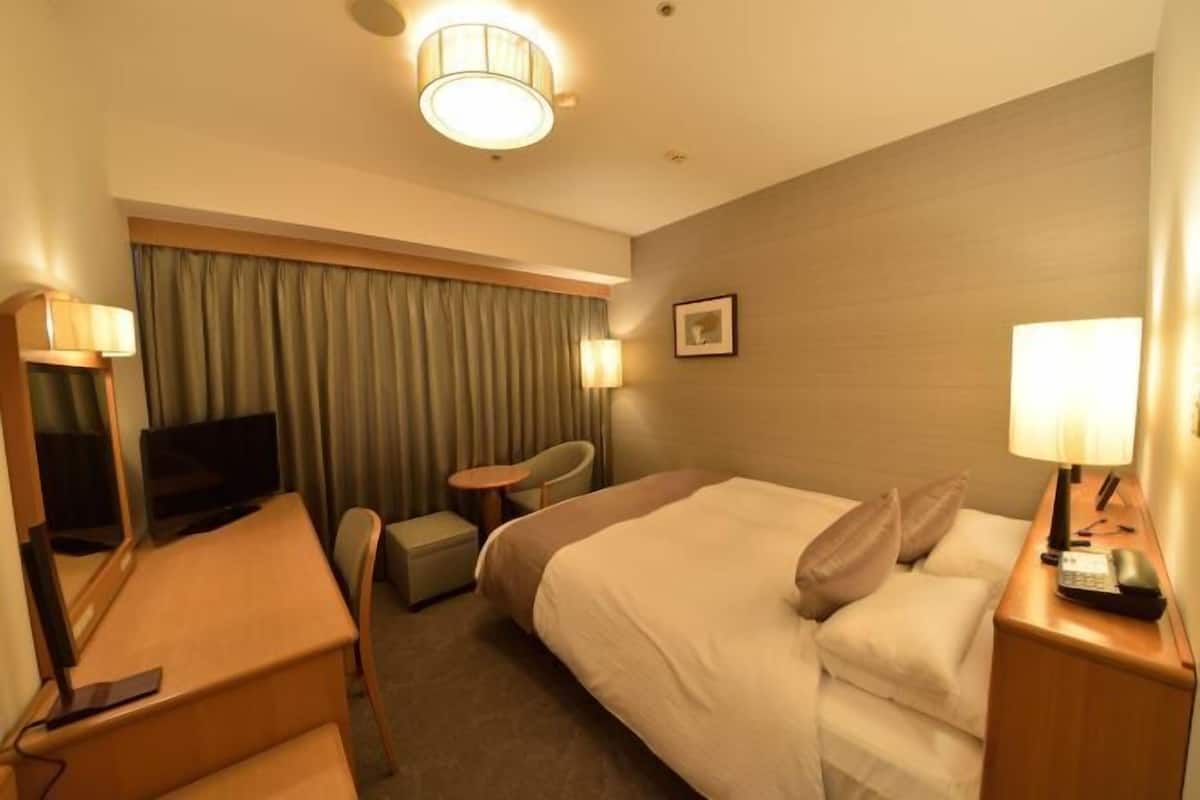 Down duvets, desk, blackout curtains, iron/ironing board