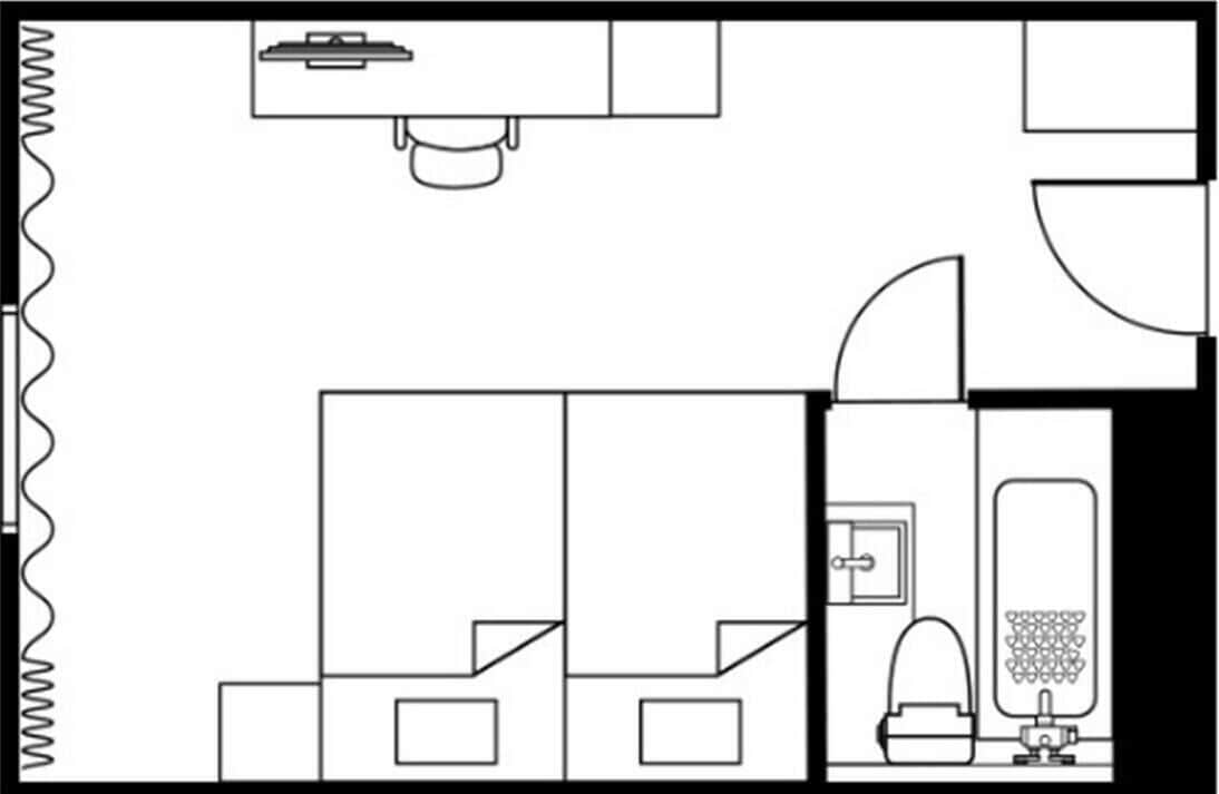 A hotel room layout with a bed, a desk, a chair, a wardrobe, and a bathroom.