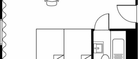 A hotel room layout with a bed, a desk, a chair, a wardrobe, and a bathroom.