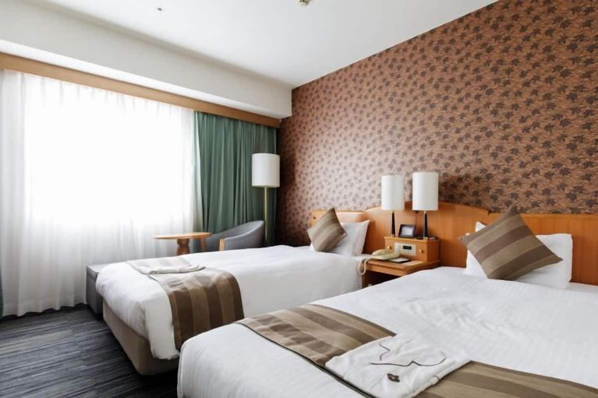 Down duvets, desk, blackout curtains, iron/ironing board