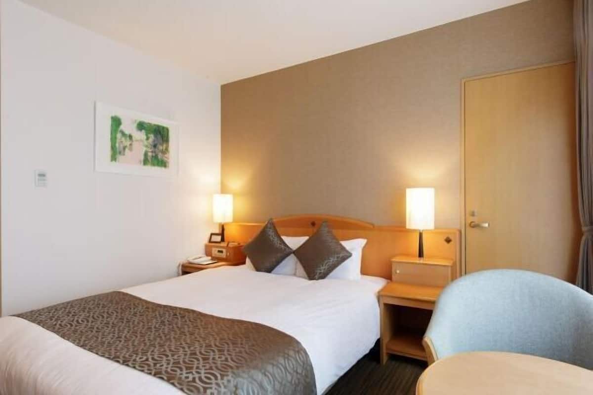 Down duvets, desk, blackout curtains, iron/ironing board