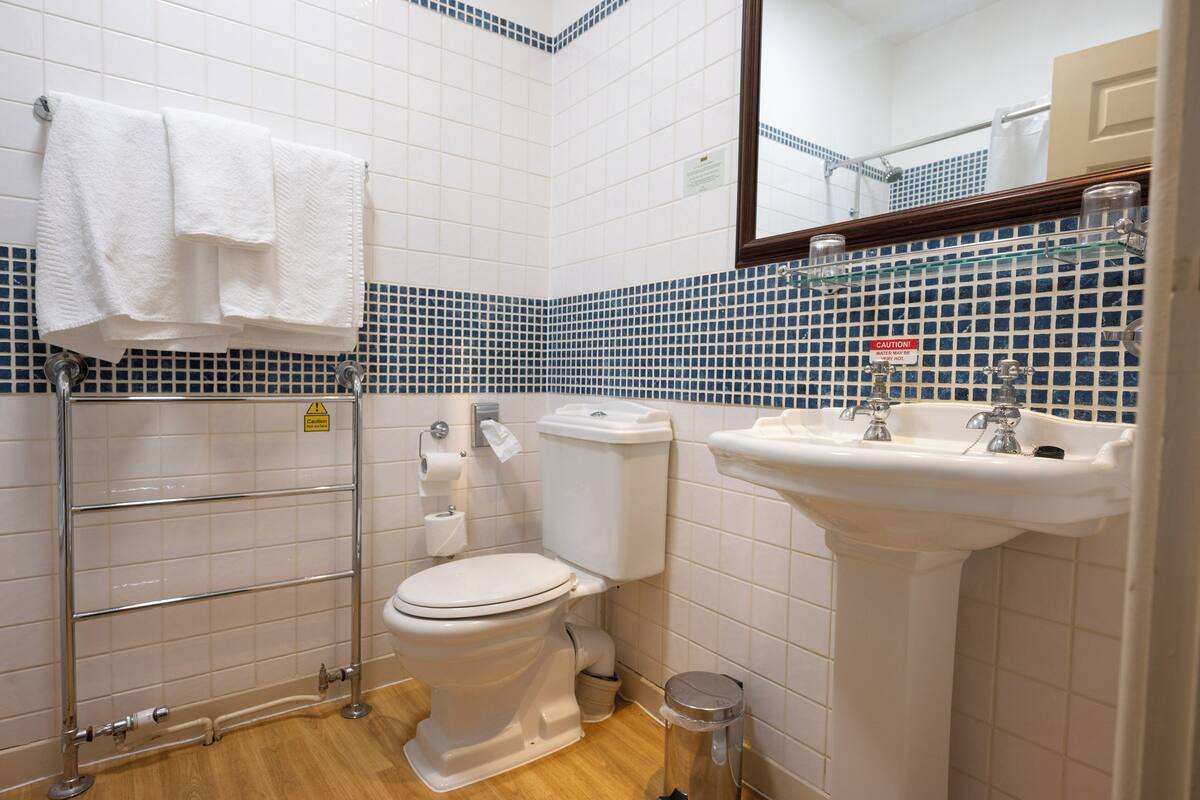 superior room | bathroom | hair dryer, towels