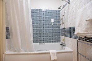 Superior Room | Bathroom | Hair dryer, towels