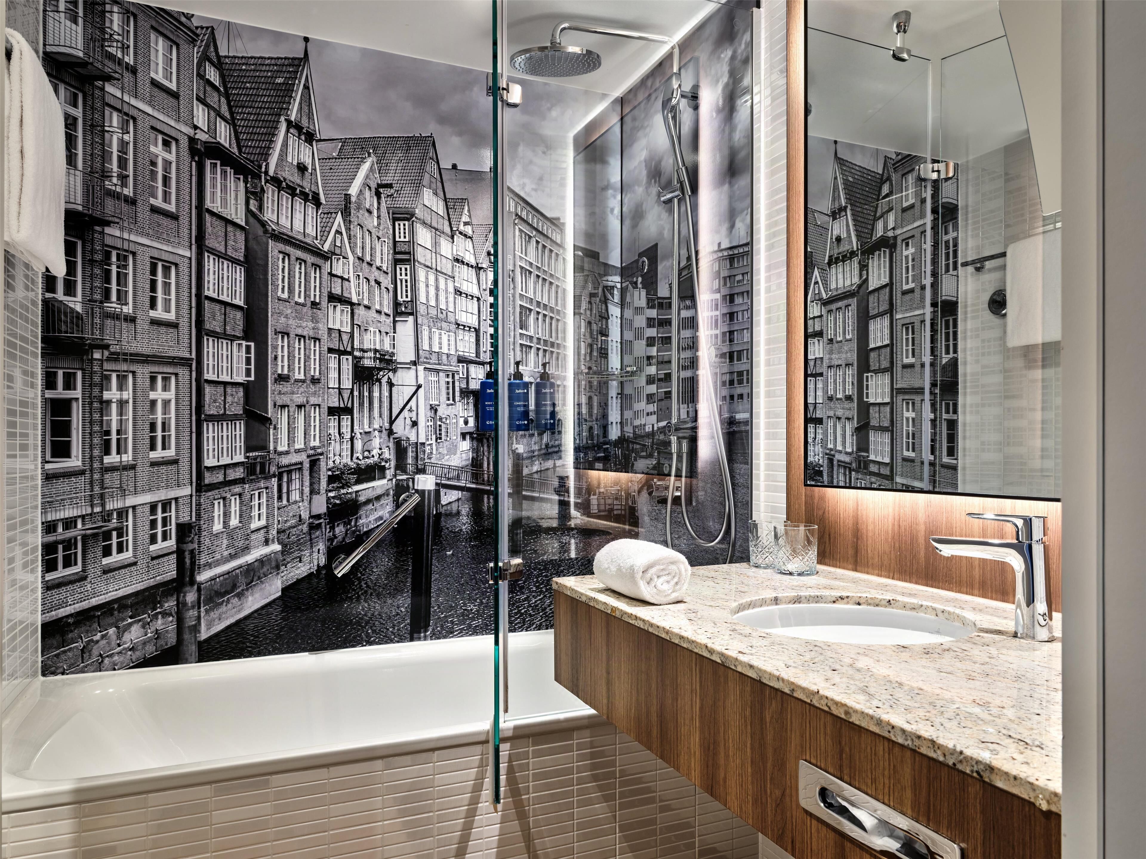 superior room | bathroom | shower, deep-soaking bathtub, free toiletries, hair dryer