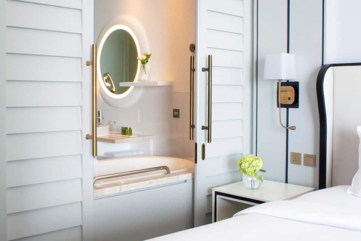 Superior Room, 1 King Bed, Balcony, Partial Sea View | Down comforters, minibar, in-room safe, desk