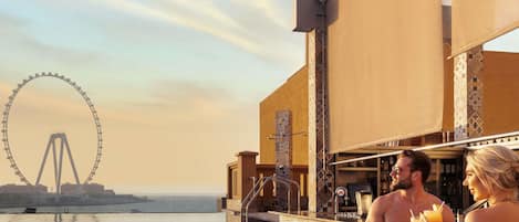 Rooftop bar, ocean views, open daily