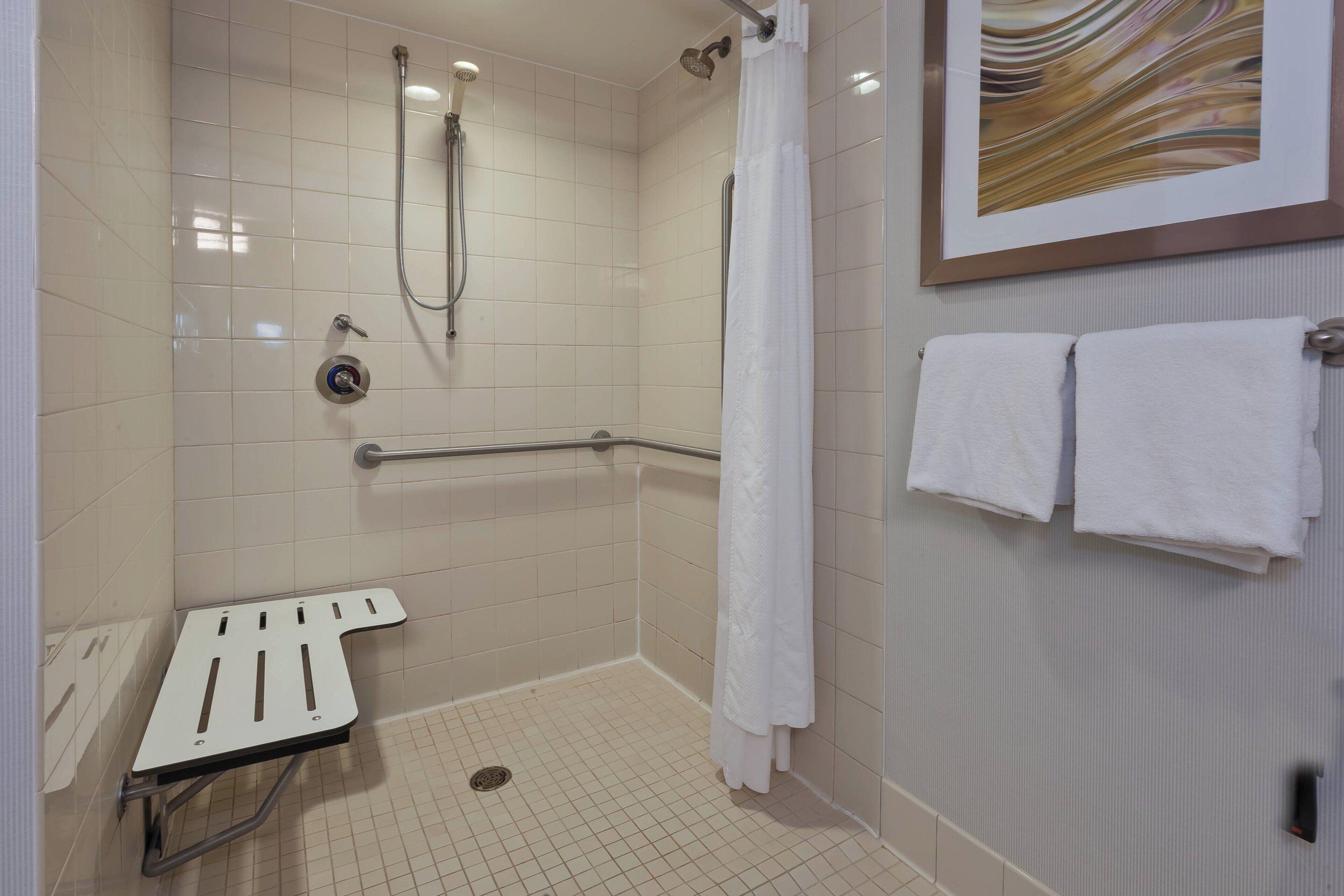 room, 1 king bed with sofa bed, non smoking | bathroom | combined shower/bathtub, hair dryer, towels