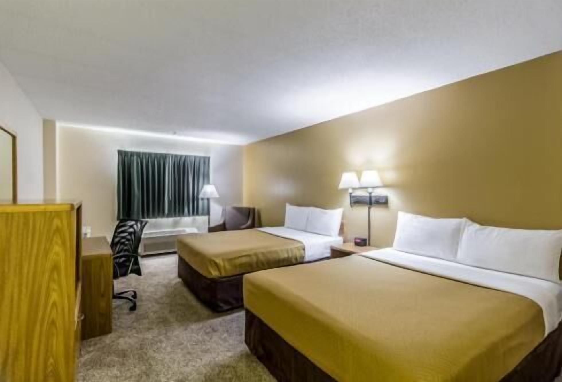 Desk, iron/ironing board, free cribs/infant beds, rollaway beds