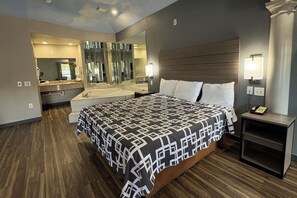 Suite, 1 King Bed, Non Smoking (Jacuzzi Tub) | Desk, iron/ironing board, free WiFi, bed sheets - Regency Inn & Suites By Capital O Houston IAH Airport (Humble)