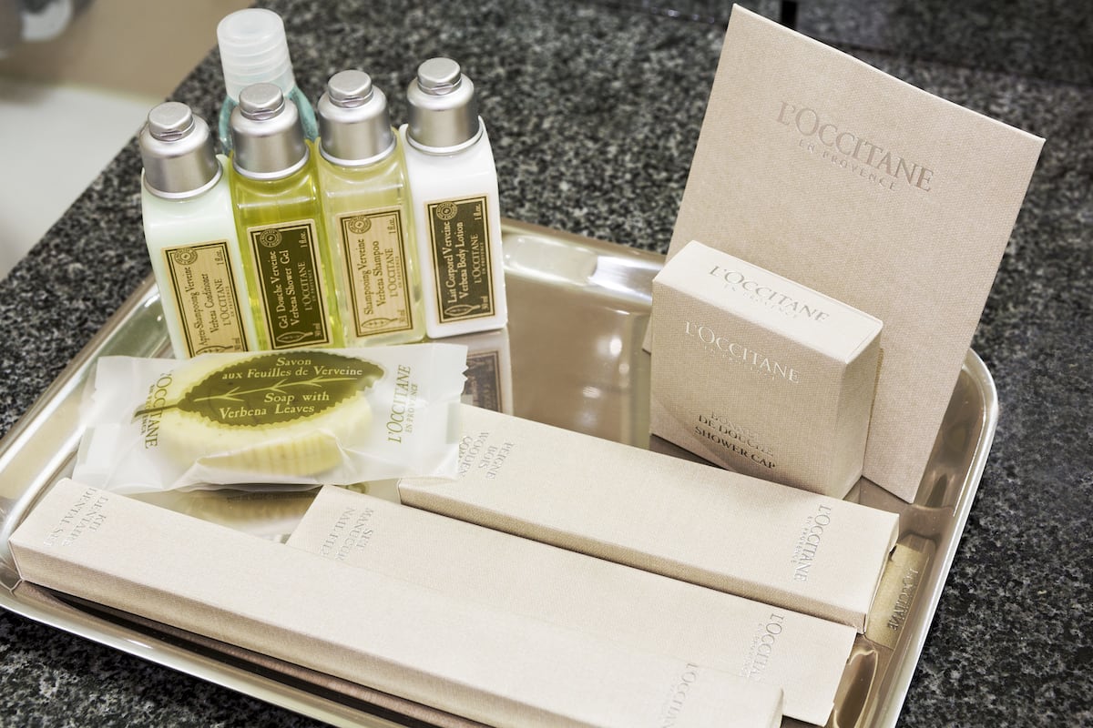 suite, 1 king bed with sofa bed, non smoking, balcony | bathroom amenities | shower, free toiletries, hair dryer, towels