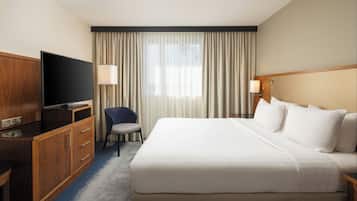 Suite, 1 King Bed with Sofa bed, Balcony | Hypo-allergenic bedding, pillowtop beds, in-room safe, desk