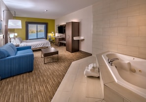 Suite, 1 King Bed, Jetted Tub | Desk, laptop workspace, blackout drapes, iron/ironing board - Holiday Inn Express Hotel & Suites Minden by IHG (Minden)