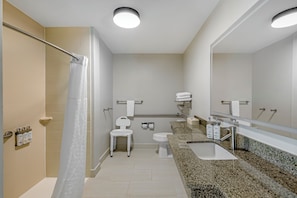 Suite, 1 King Bed, Accessible (Mobility Accessible, Communications) | Bathroom | Combined shower/tub, free toiletries, hair dryer, towels