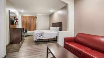 Suite, 1 Tempat Tidur King dengan tempat tidur Sofa, Bebas Asap Rokok | Tempat tidur bayi gratis, Wi-Fi gratis, dan seprai linen