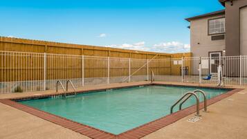 Outdoor pool, pool umbrellas, sun loungers
