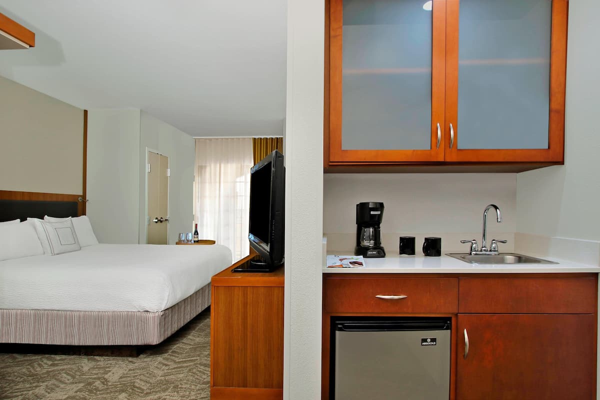 Hypo-allergenic bedding, down duvets, pillow-top beds, in-room safe