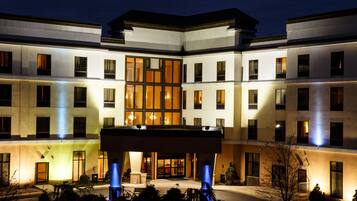Stunning hotel with a central entrance and symmetrical design.