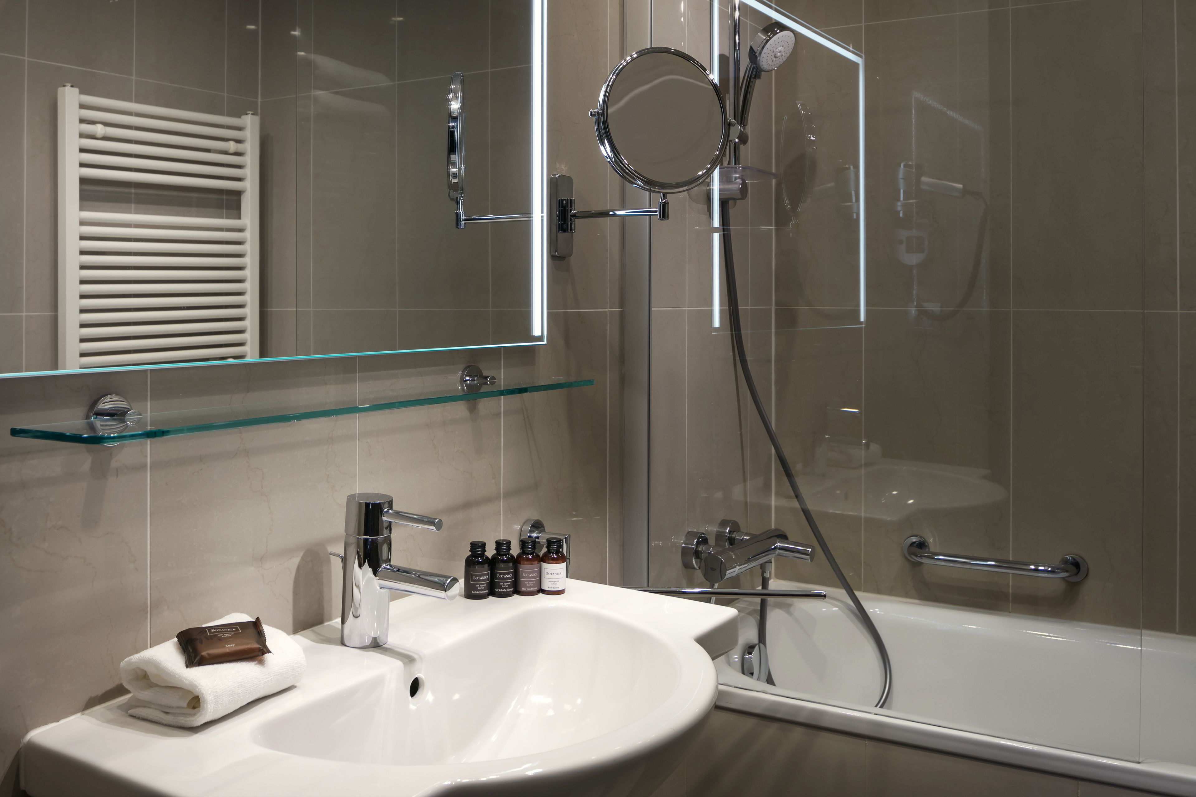 combined shower/bathtub, free toiletries, hair dryer, bathrobes