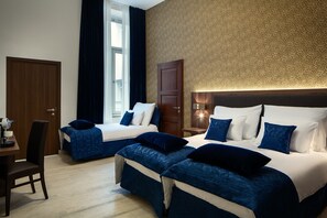 Premium bedding, memory foam beds, minibar, in-room safe