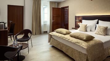 Premium bedding, memory-foam beds, minibar, in-room safe