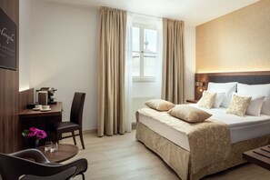 Premium bedding, memory foam beds, minibar, in-room safe