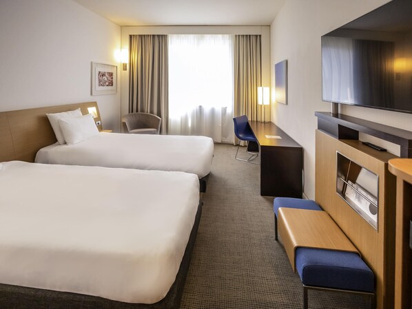 Ropa de cama de alta calidad y minibar 