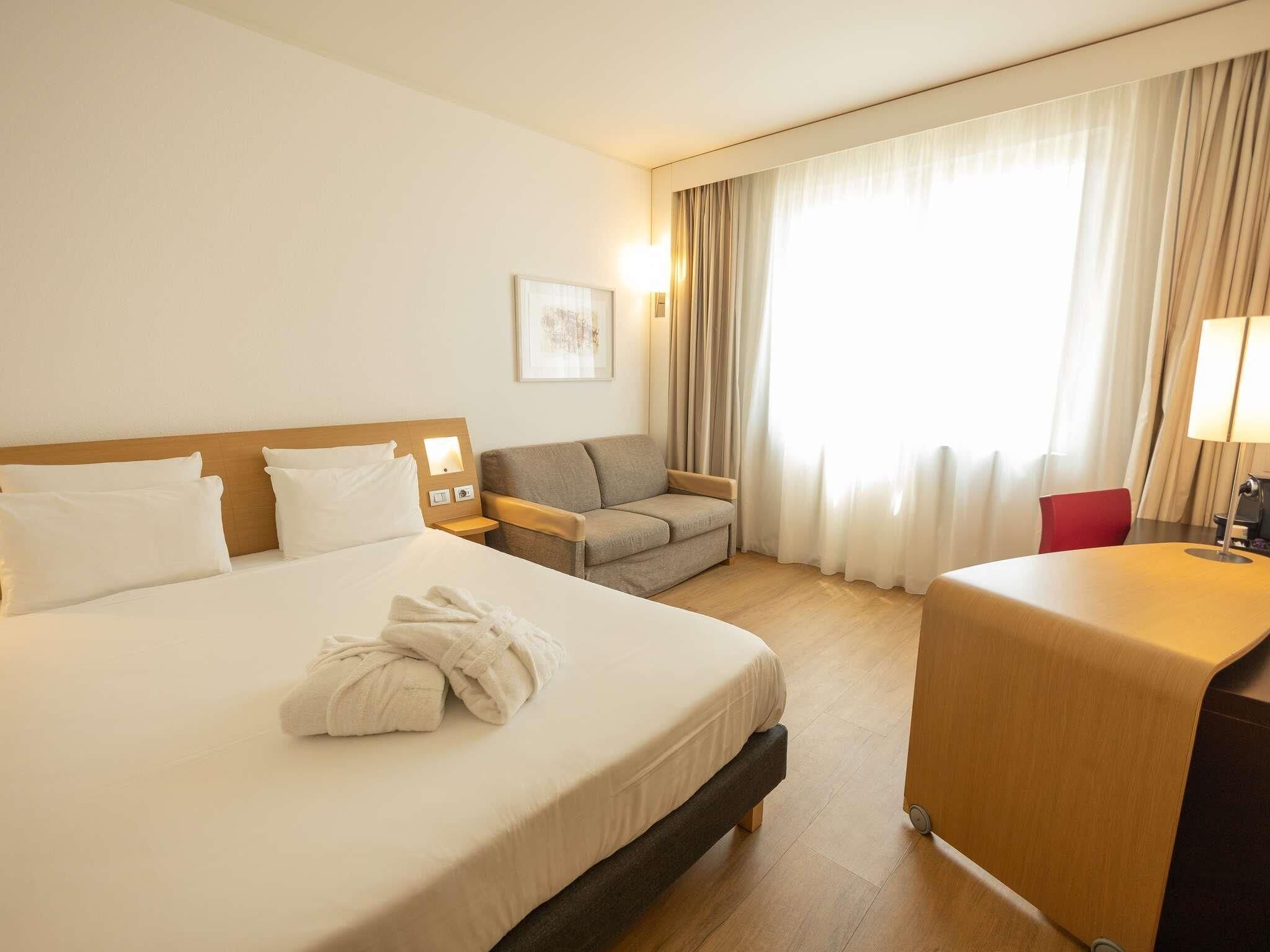 Habitación ejecutiva, 1 cama matrimonial | Ropa de cama de alta calidad y minibar 